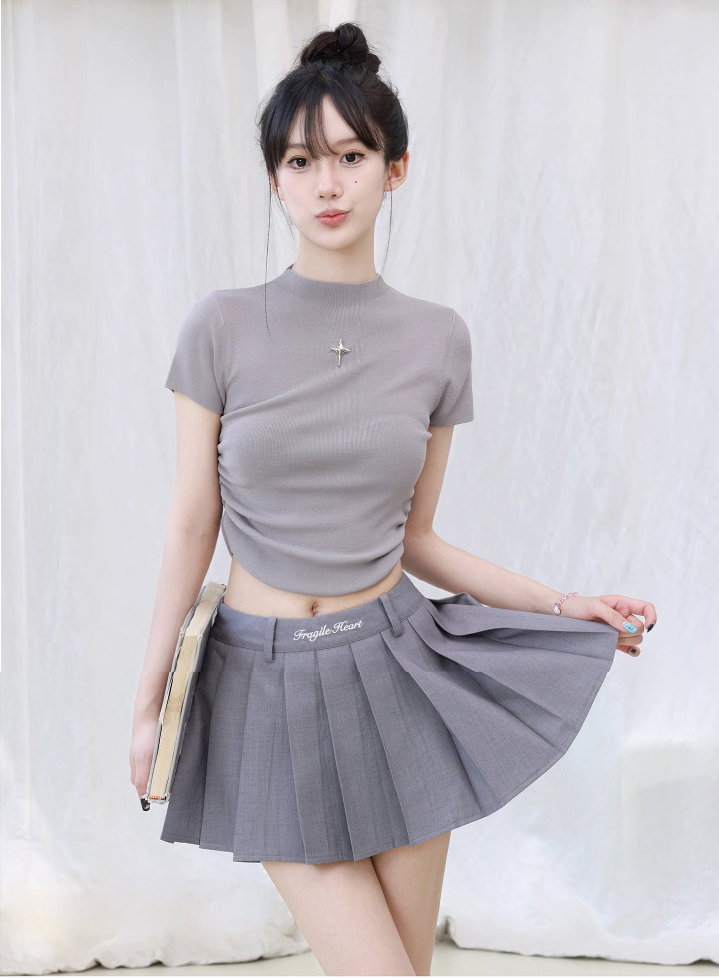 Short length pleated skirts