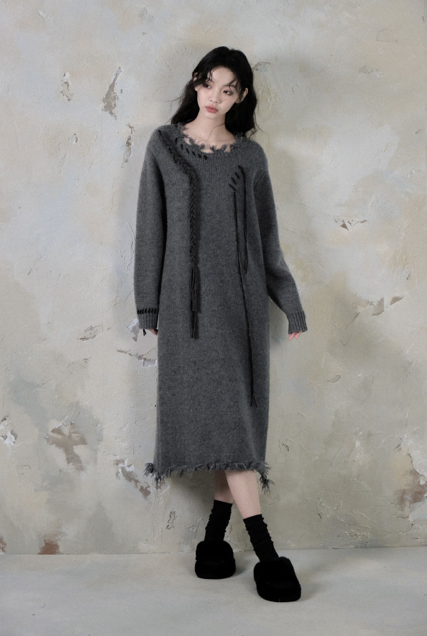 Loose mid-length above-the-knee sweater dress