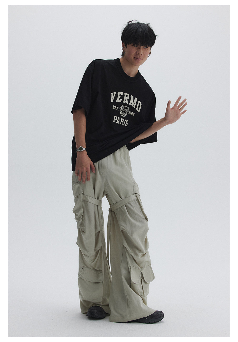 Straight pants with irregular design straps