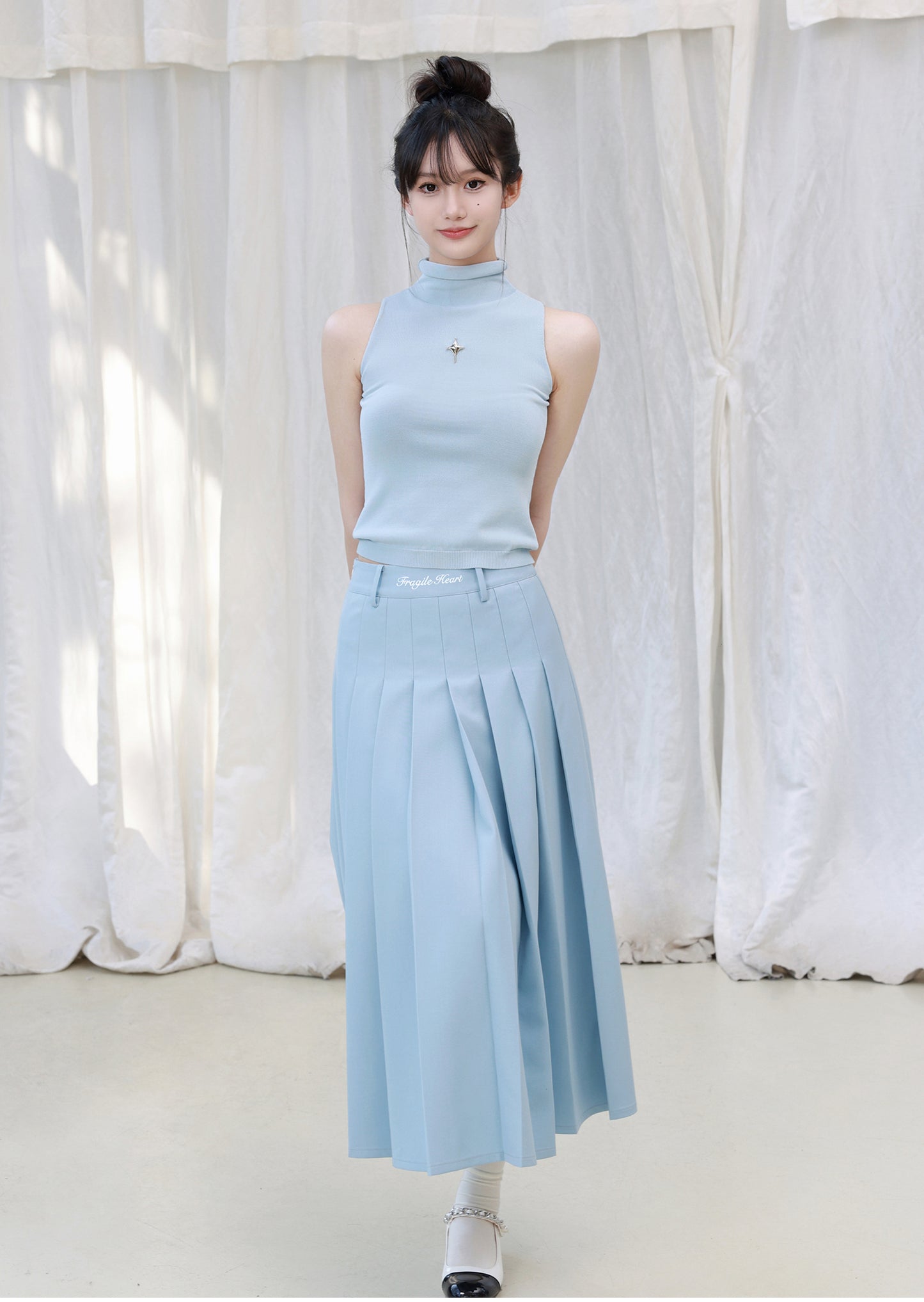 Long-length pleated skirt