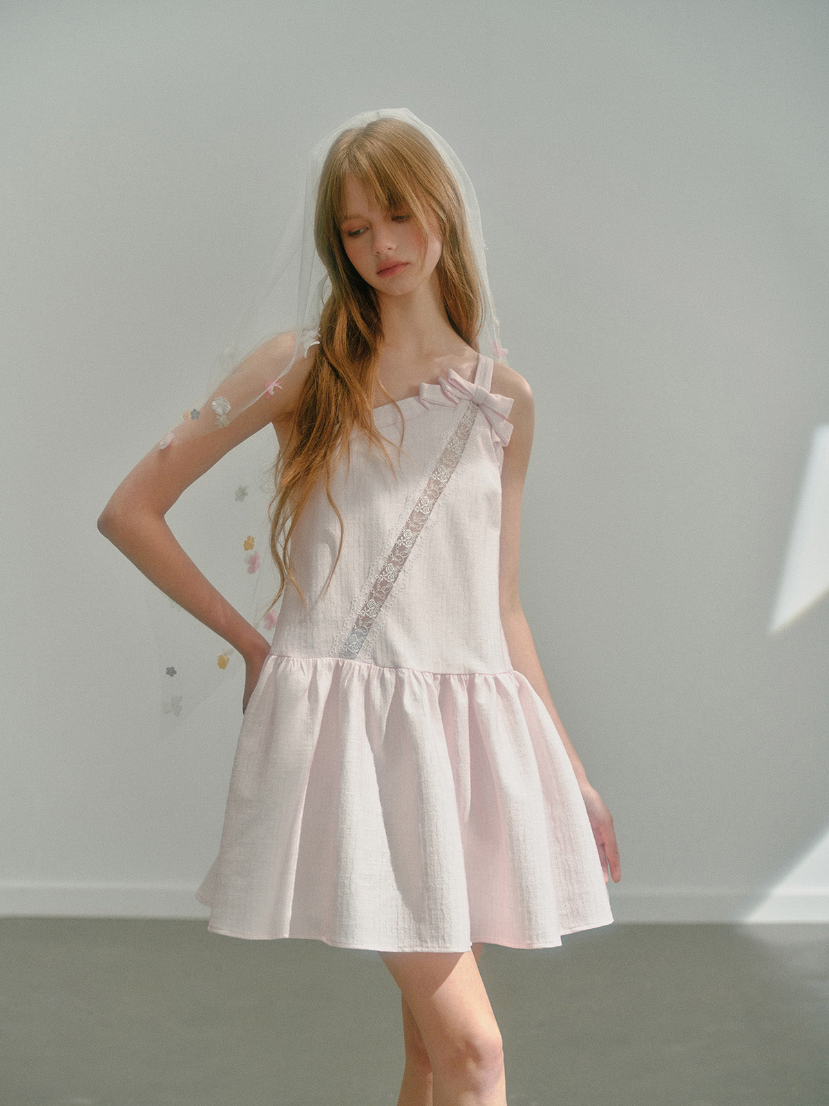 Hollow ribbon suspender dress