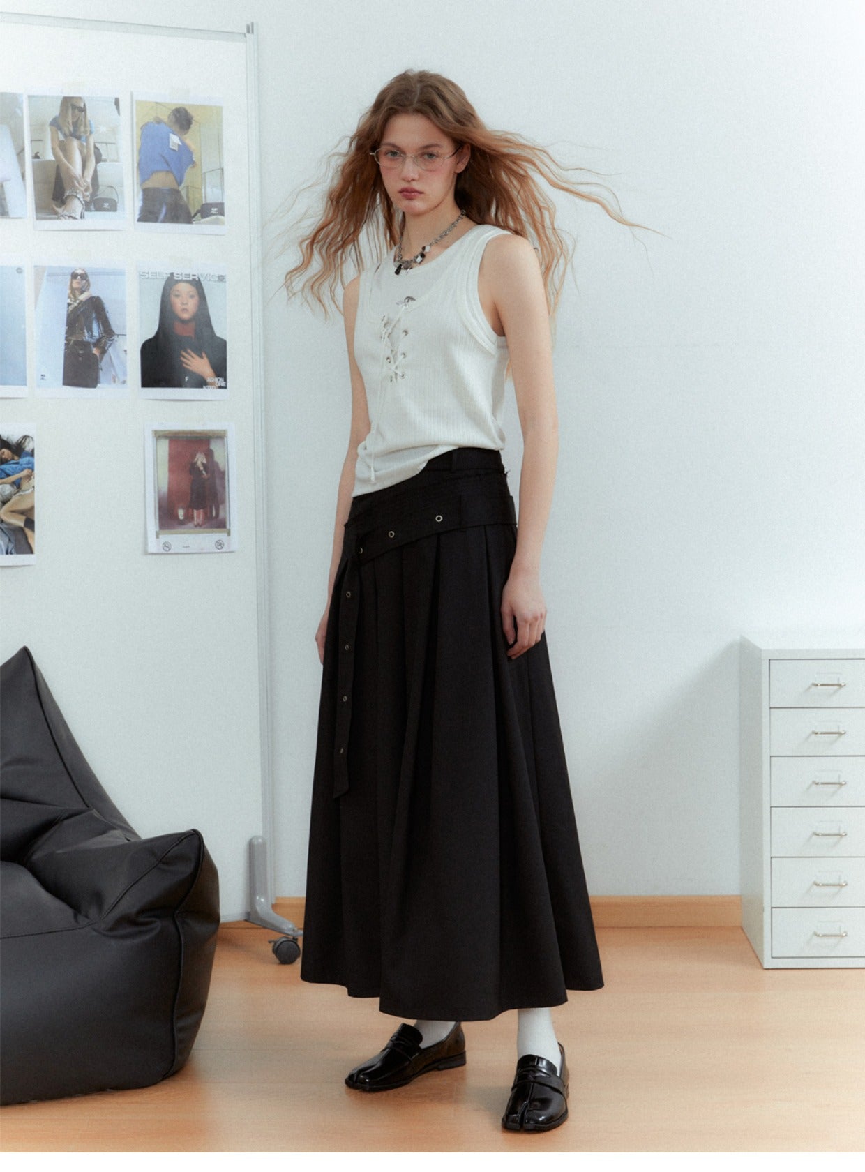 Asymmetrical long length pleated skirt