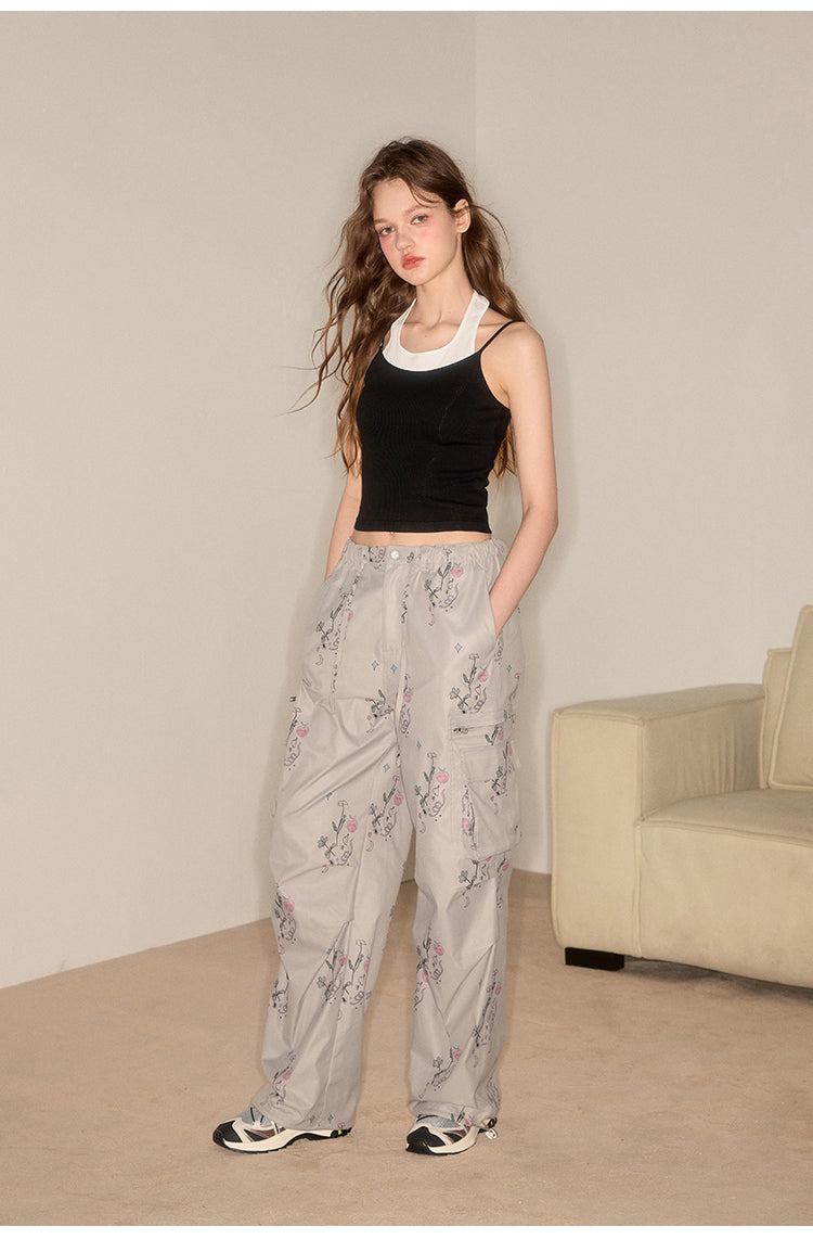 Straight casual pants with flower-patterned pockets