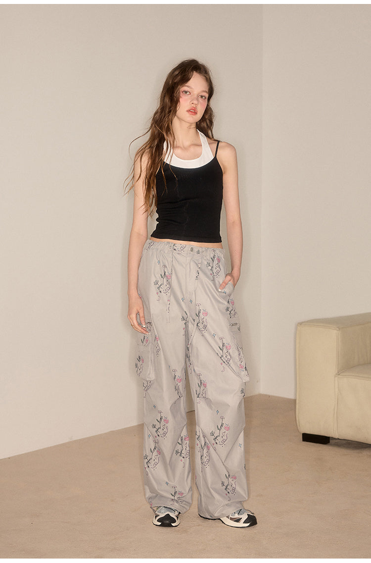 Straight casual pants with flower-patterned pockets