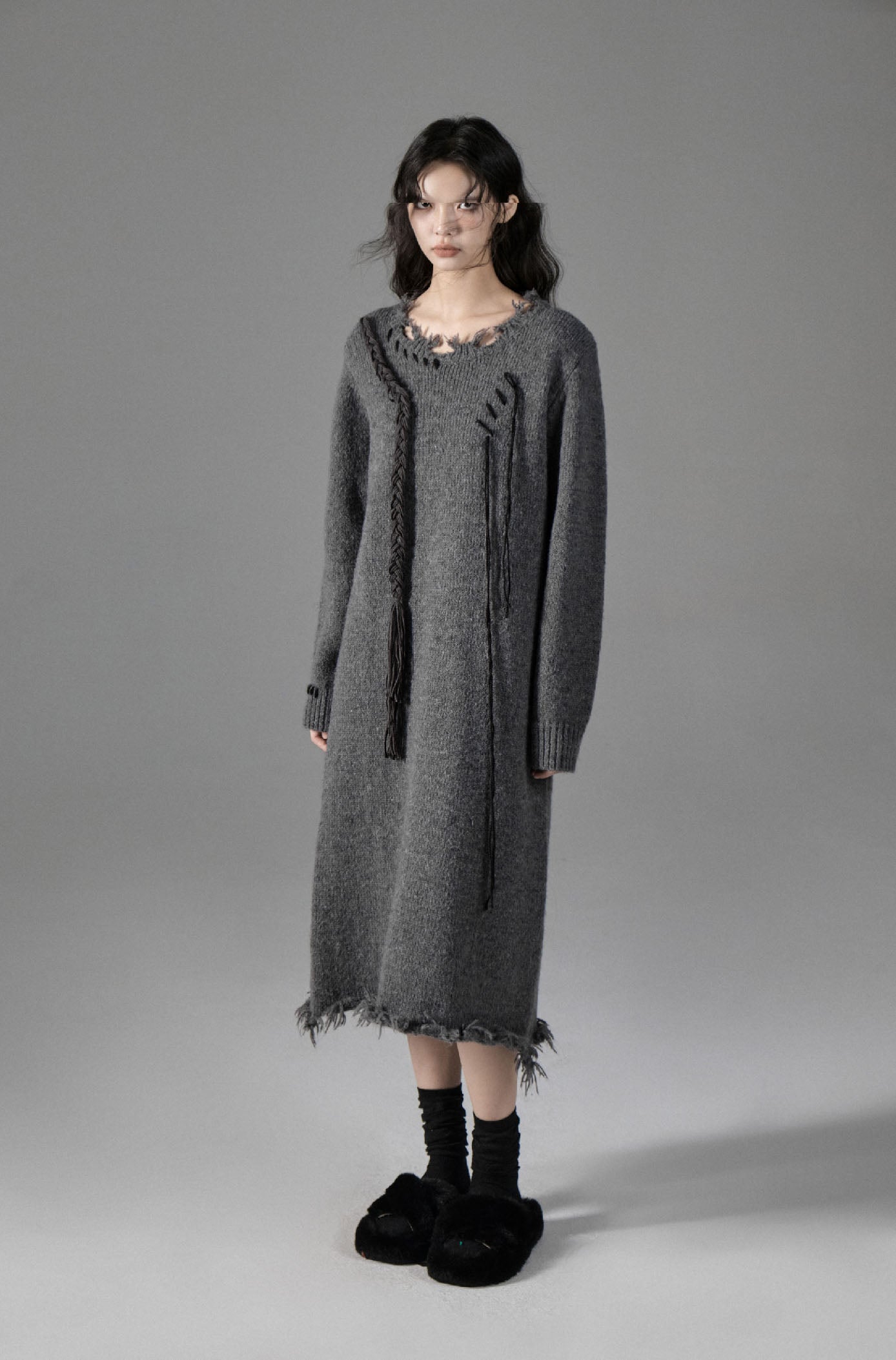 Loose mid-length above-the-knee sweater dress