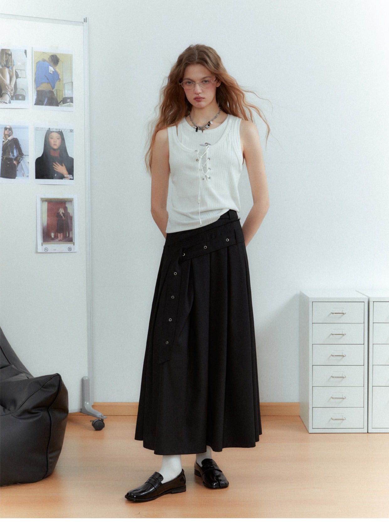 Asymmetrical long length pleated skirt