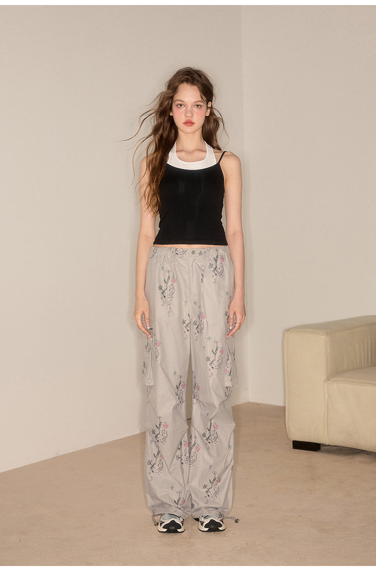 Straight casual pants with flower-patterned pockets