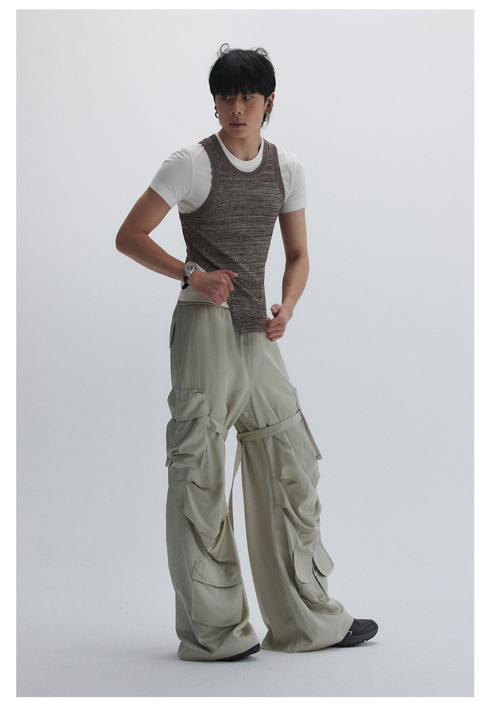 Straight pants with irregular design straps