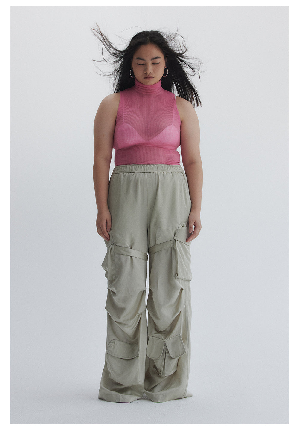 Straight pants with irregular design straps