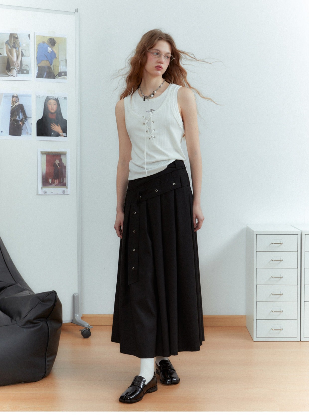 Asymmetrical long length pleated skirt