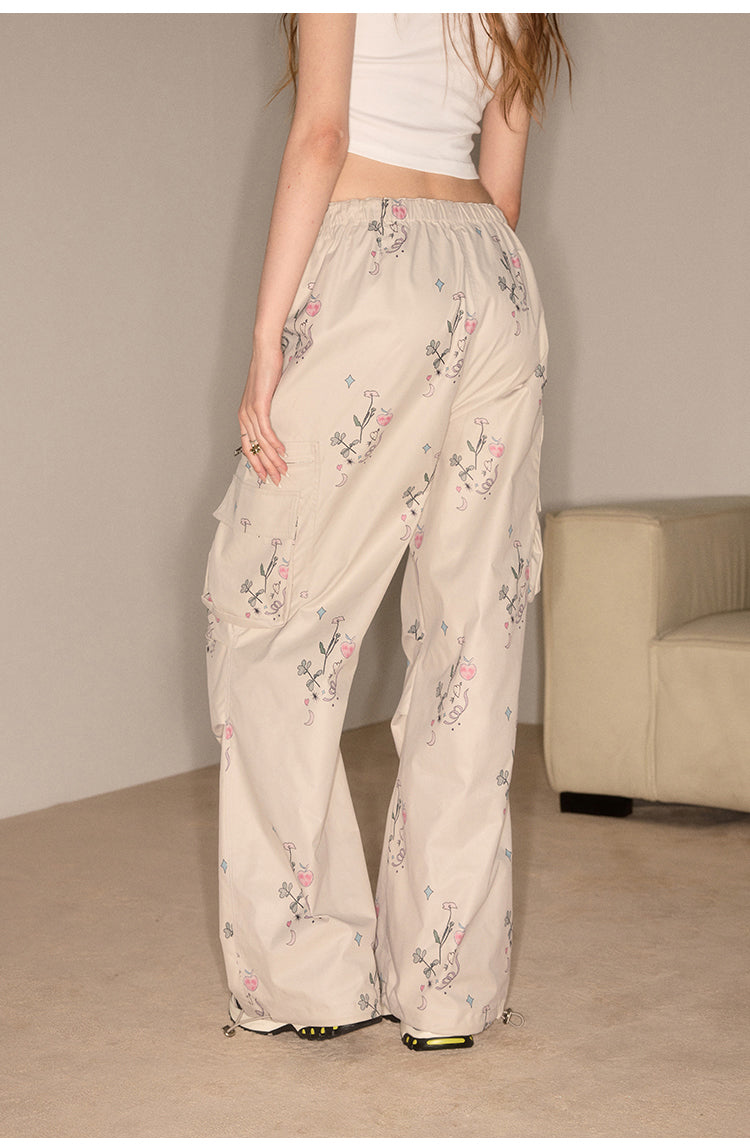 Straight casual pants with flower-patterned pockets