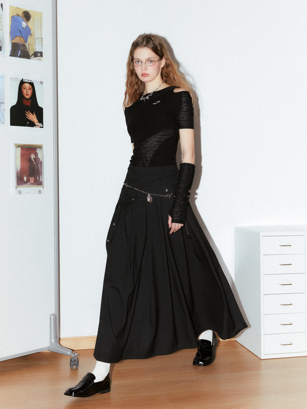 Asymmetrical long length pleated skirt