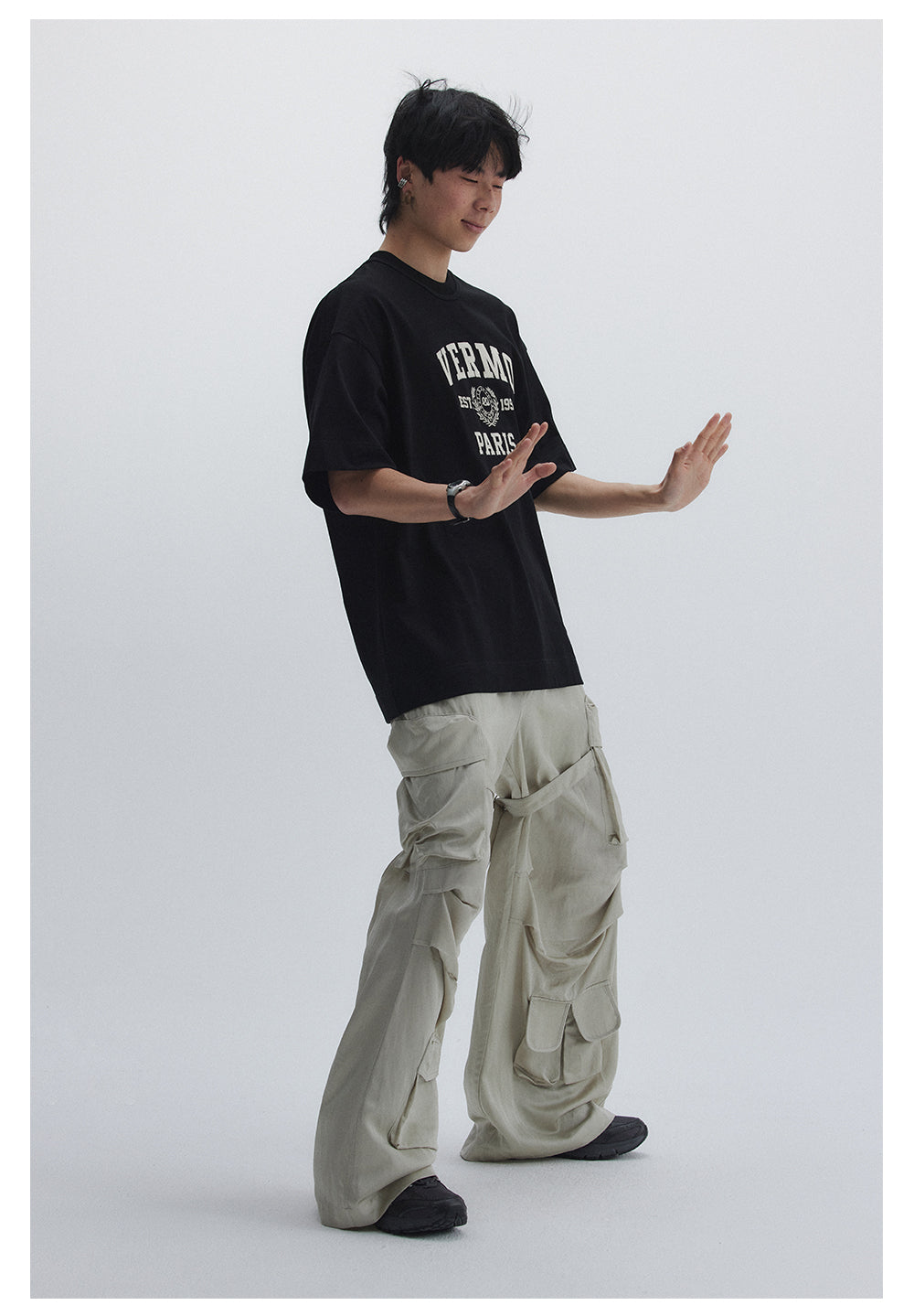 Straight pants with irregular design straps