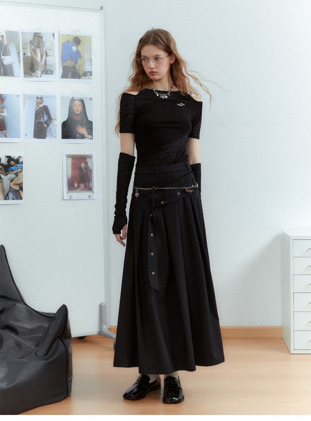 Asymmetrical long length pleated skirt