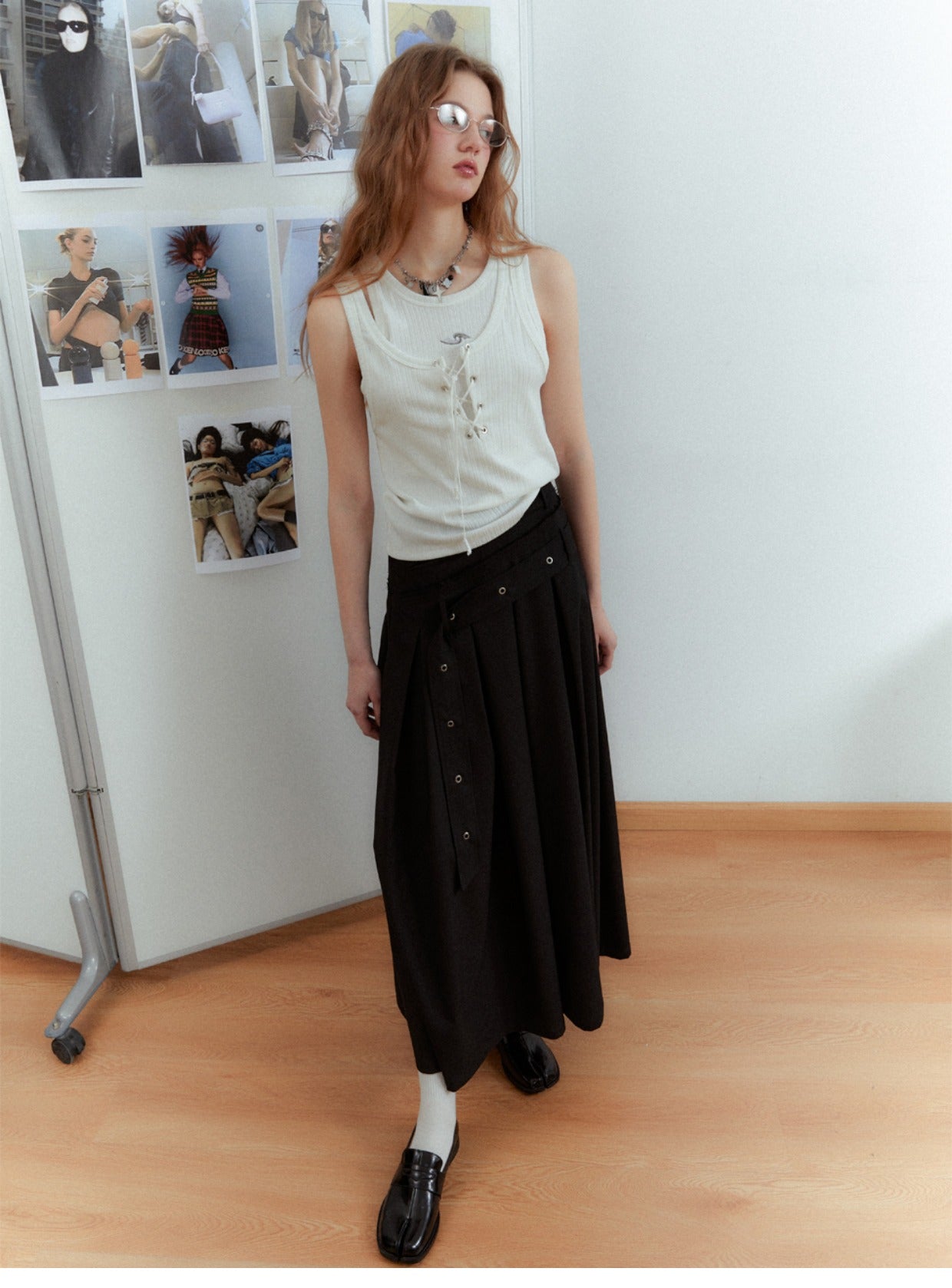 Asymmetrical long length pleated skirt