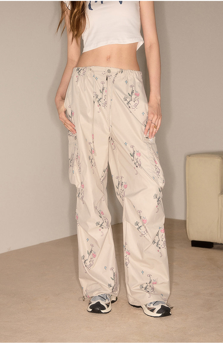 Straight casual pants with flower-patterned pockets