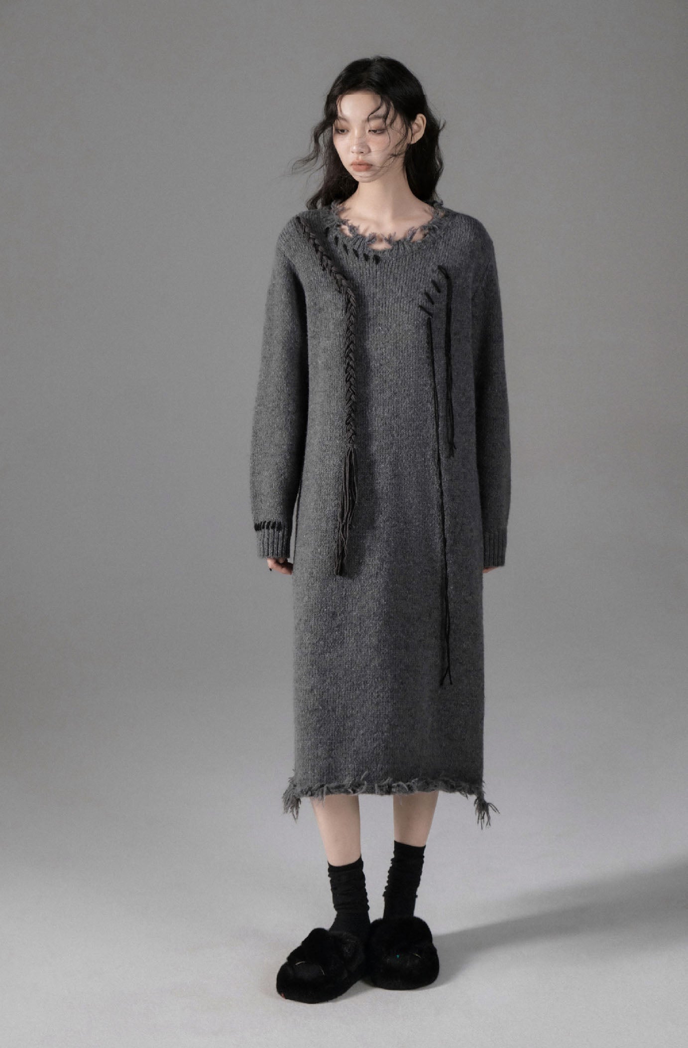 Loose mid-length above-the-knee sweater dress