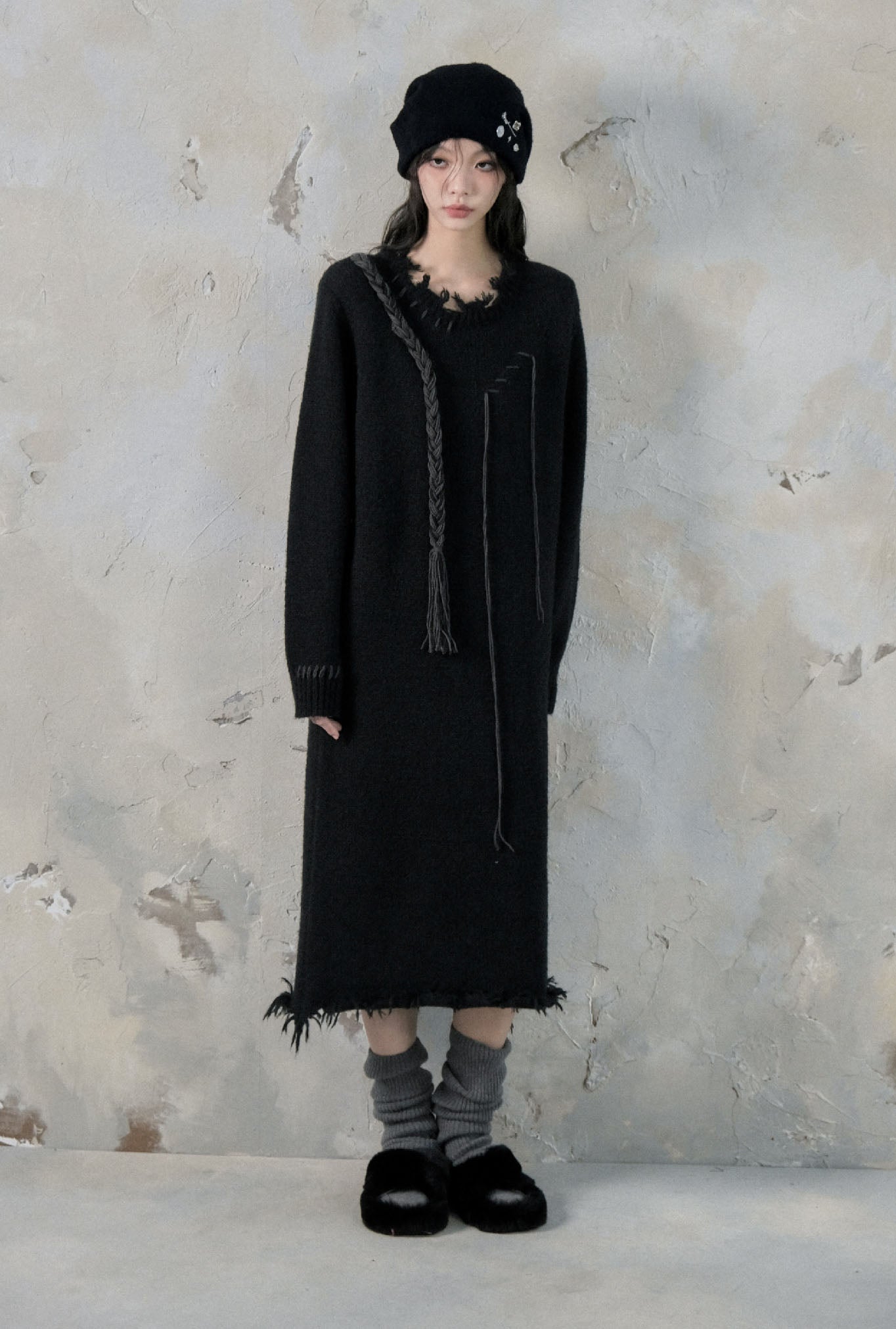 Loose mid-length above-the-knee sweater dress