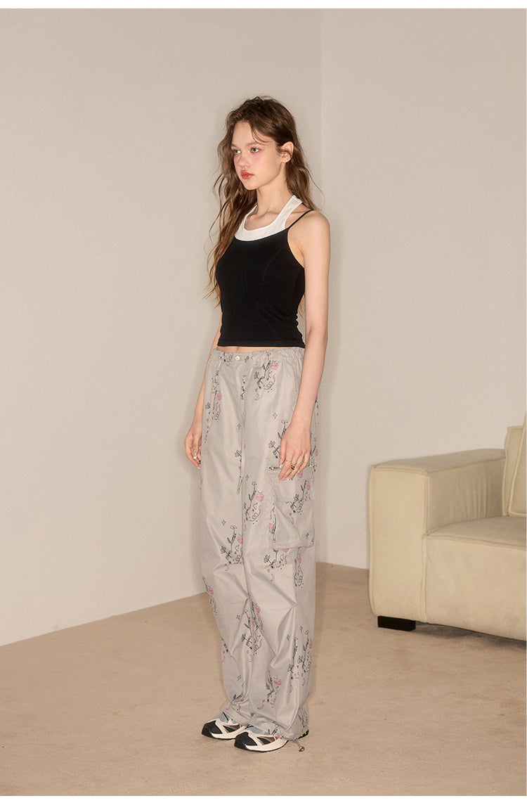 Straight casual pants with flower-patterned pockets