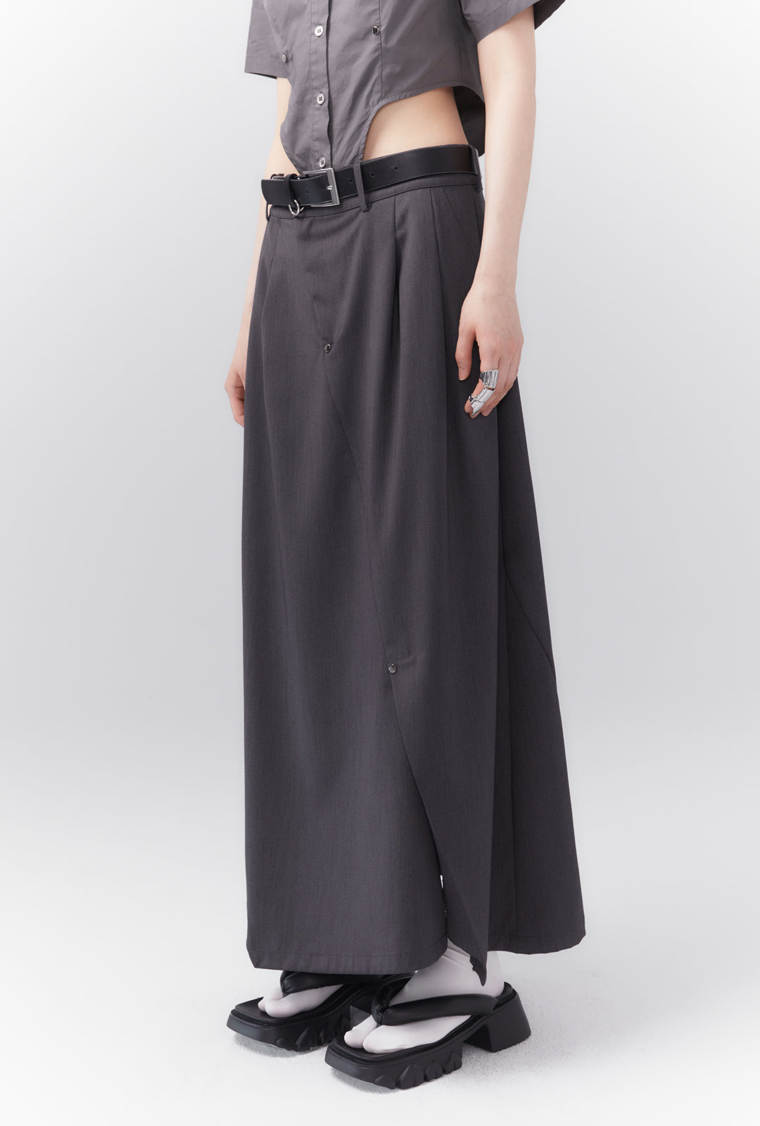 Asymmetrical long length pleated skirt